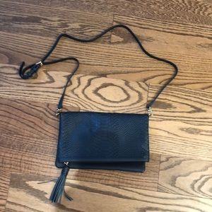 Black leather clutch with straps